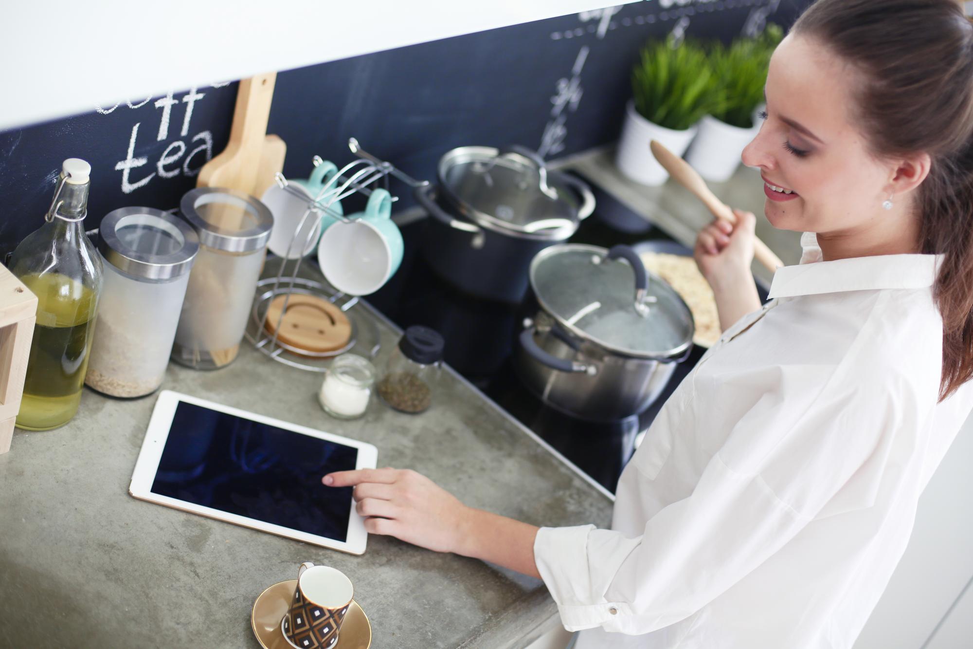 Modern kitchen workspace with digital tools